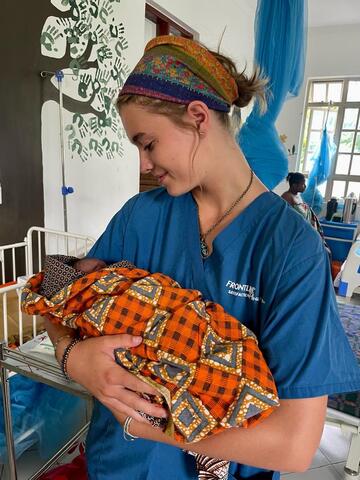 Volunteer with baby