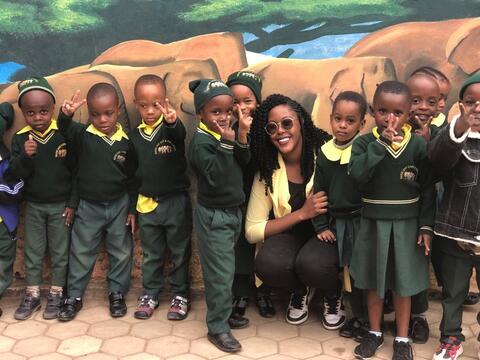 Volunteer with school children